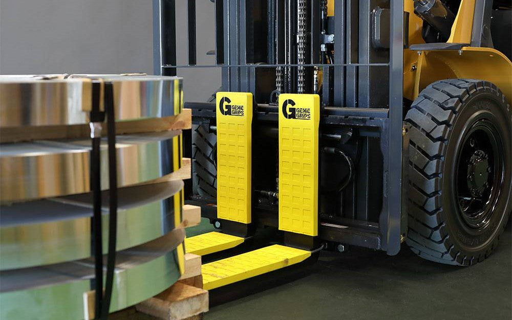 Three-step infographic showing a removable bollard workflow: closed position with post installed and locked in the ground sleeve, removed position with a worker lifting the post out of the sleeve, and safe/covered position with the hinged cover flipped down flat over the sleeve opening.