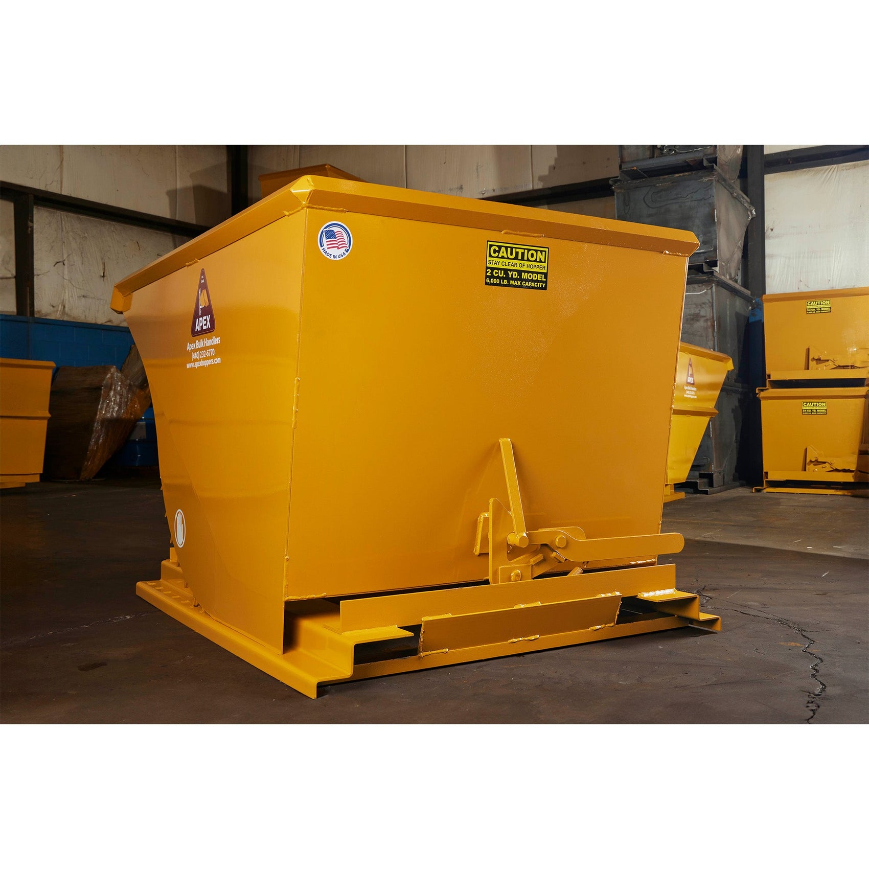 Three-step infographic showing a removable bollard workflow: closed position with post installed and locked in the ground sleeve, removed position with a worker lifting the post out of the sleeve, and safe/covered position with the hinged cover flipped down flat over the sleeve opening.